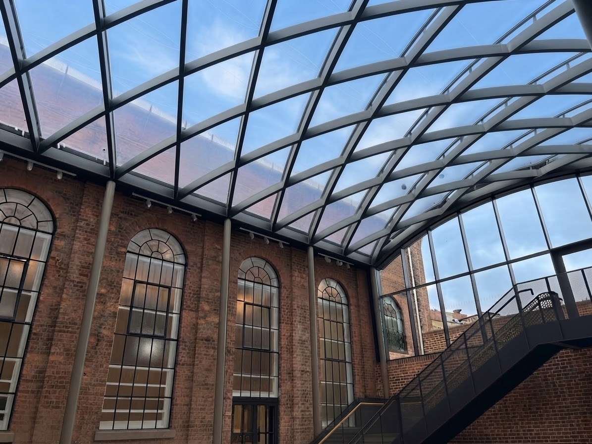 Curved ETFE barrel-vault rooflight over a brick courtyard at Kidderminster Town Hall